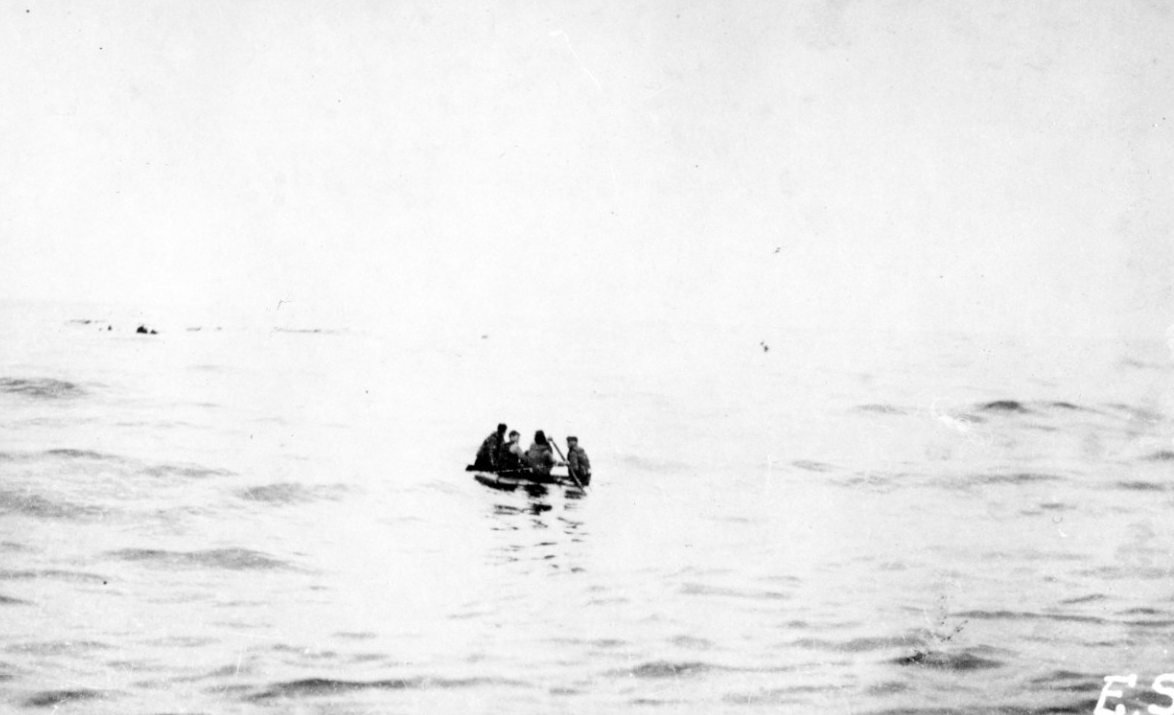 Survivors await rescue in their life raft, circa 1918