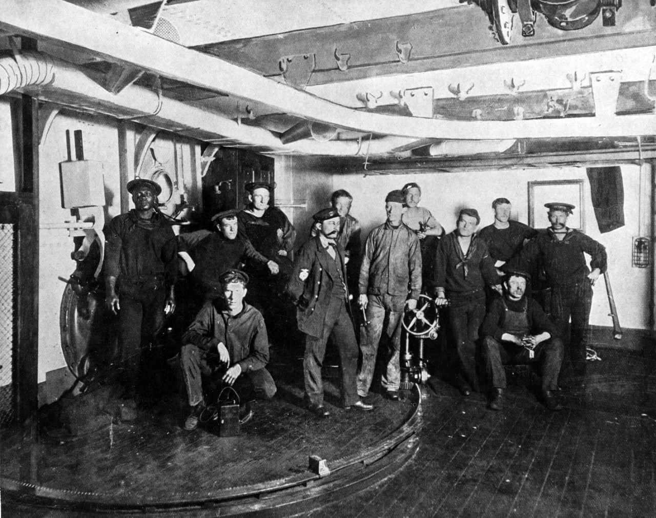 A group of crew members inside the torpedo room of a U.S. Navy ship, Maine. 