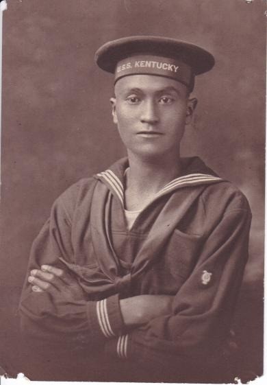 Young Native American man in a naval enlisted uniform