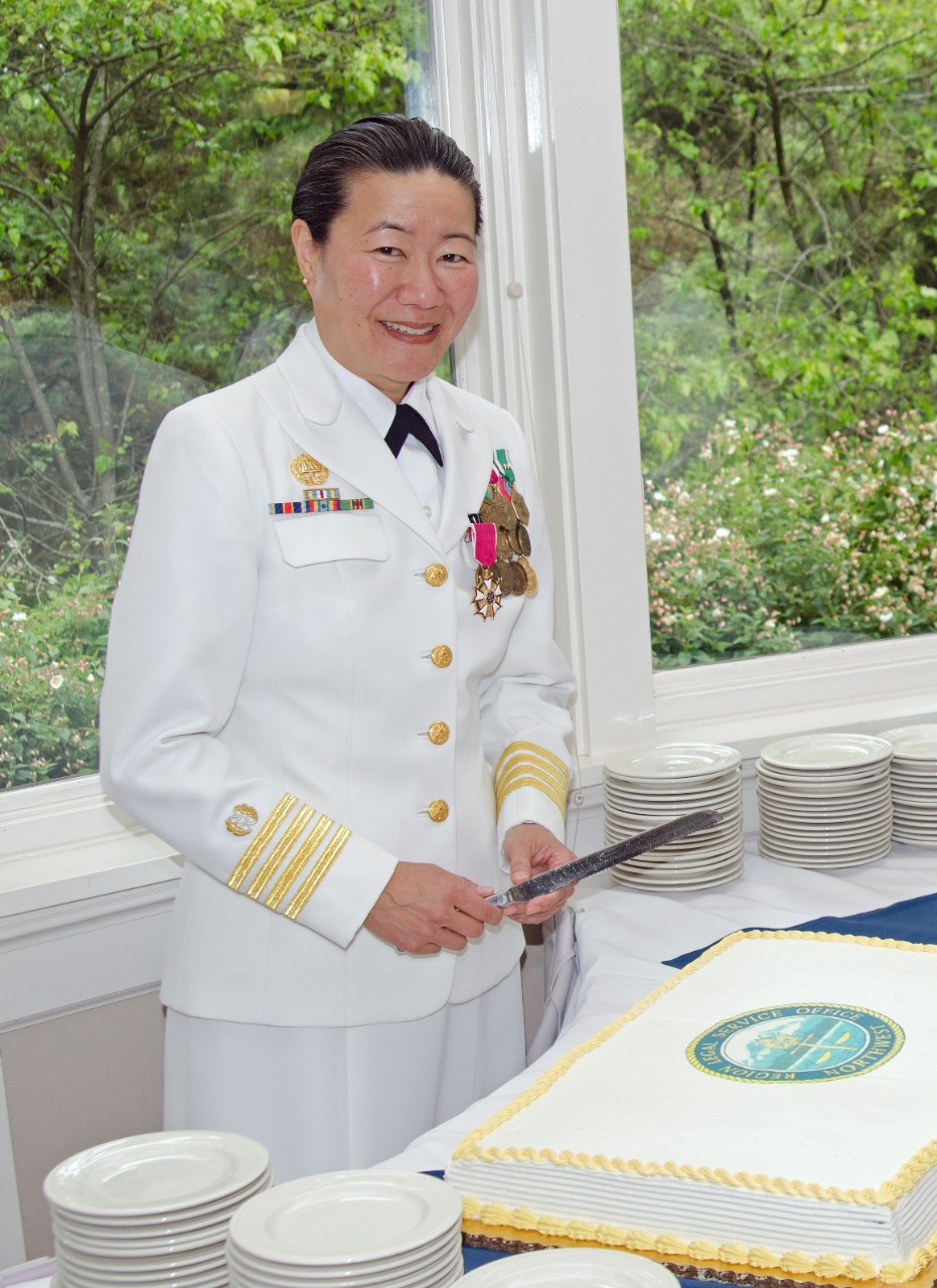 <p>CAPT Ann Minami, JAGC, USN, at her 2014 change of command (courtesy of Ann K. Minami)</p>