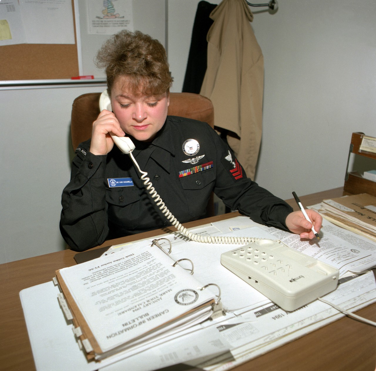Navy Counselor First Class (NC1) Cheryl Ann Cassarella is shown working at her desk at Naval Station Rota where she is the command career counselor. Petty Officer Cassarella has received orders to the nuclear-powered aircraft carrier USS Dwight D...
