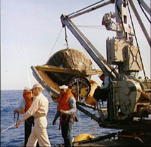 Gemini 8 spacecraft hoisted aboard the USS Leonard F. Mason