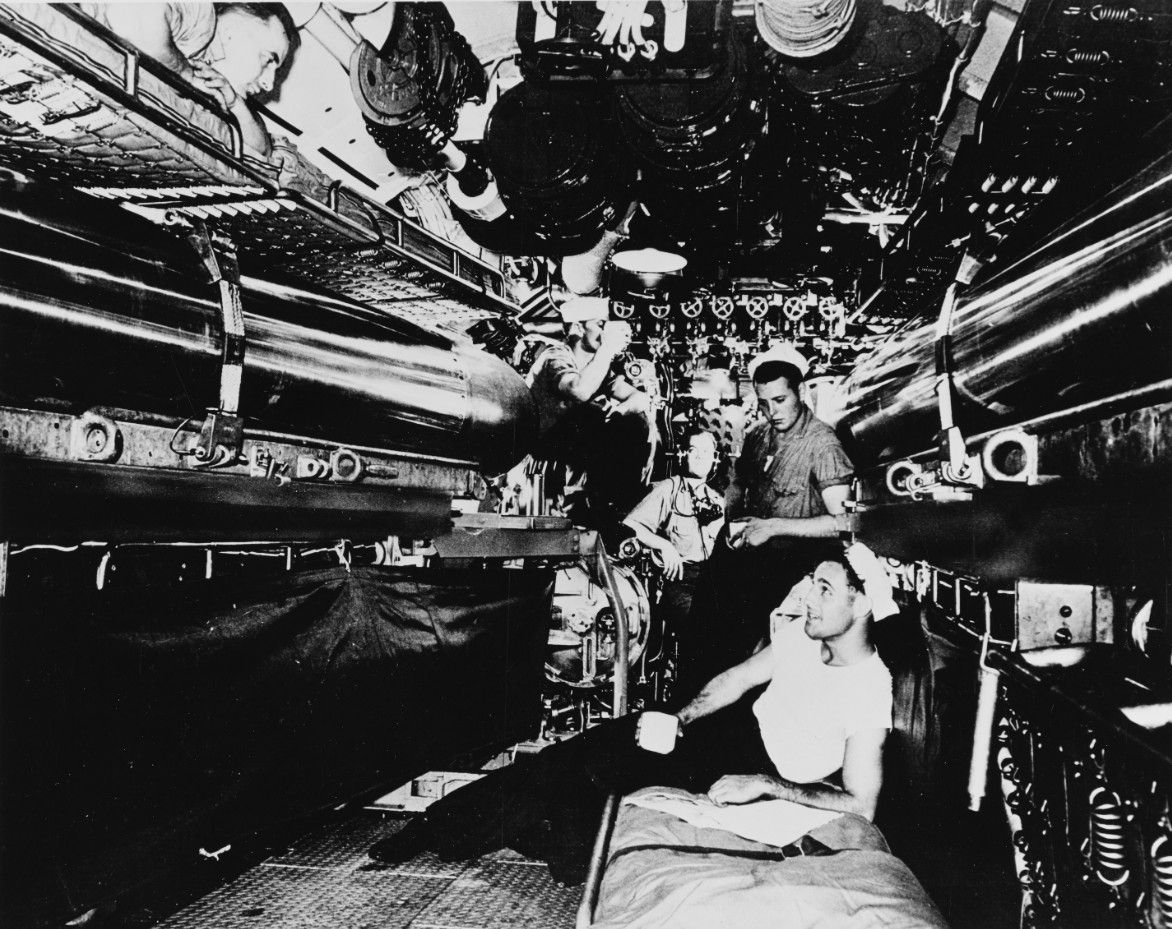 Submariners in the torpedo room