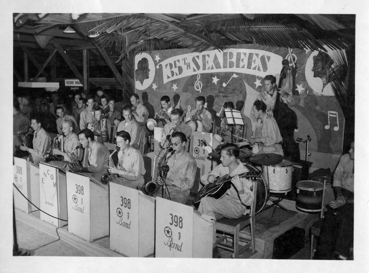 Images from the collection of LT Chaplain William Foster, Jr. during his WWII service with the 35th Seabees battalion in Manila, 1945. LT Foster was a musician and directed a local choir while stationed in Manila. The subject matter generally consists of villagers (adults and children), general Manila landscapes and buildings (including those destroyed), choirs, dances, religious services, sailors performing various duties (mess/cooking, laundry, sewing, barber, etc.), general base and aerial images, as well as ships in port. Specific base photos include: machine/mechanical shops, construction shops, supply, the motor pool, movie projection room, and Nichols Field. Several photos of Corregidor consist of tunnels and aerials. Of particular note is a series of images related to the trial of Tomoyuki Yamashita in Manila for his troops' conduct during the Japanese defense of the occupied Philippines in 1944. There is a series of ship launching and christening images unrelated to Manila or the Seabees in the collection: SS Clearwater Victory (Victory Ship), 1945; SS Gretna Victory (Victory Ship), 1945; and USS Navarro (APA-215), 1944.