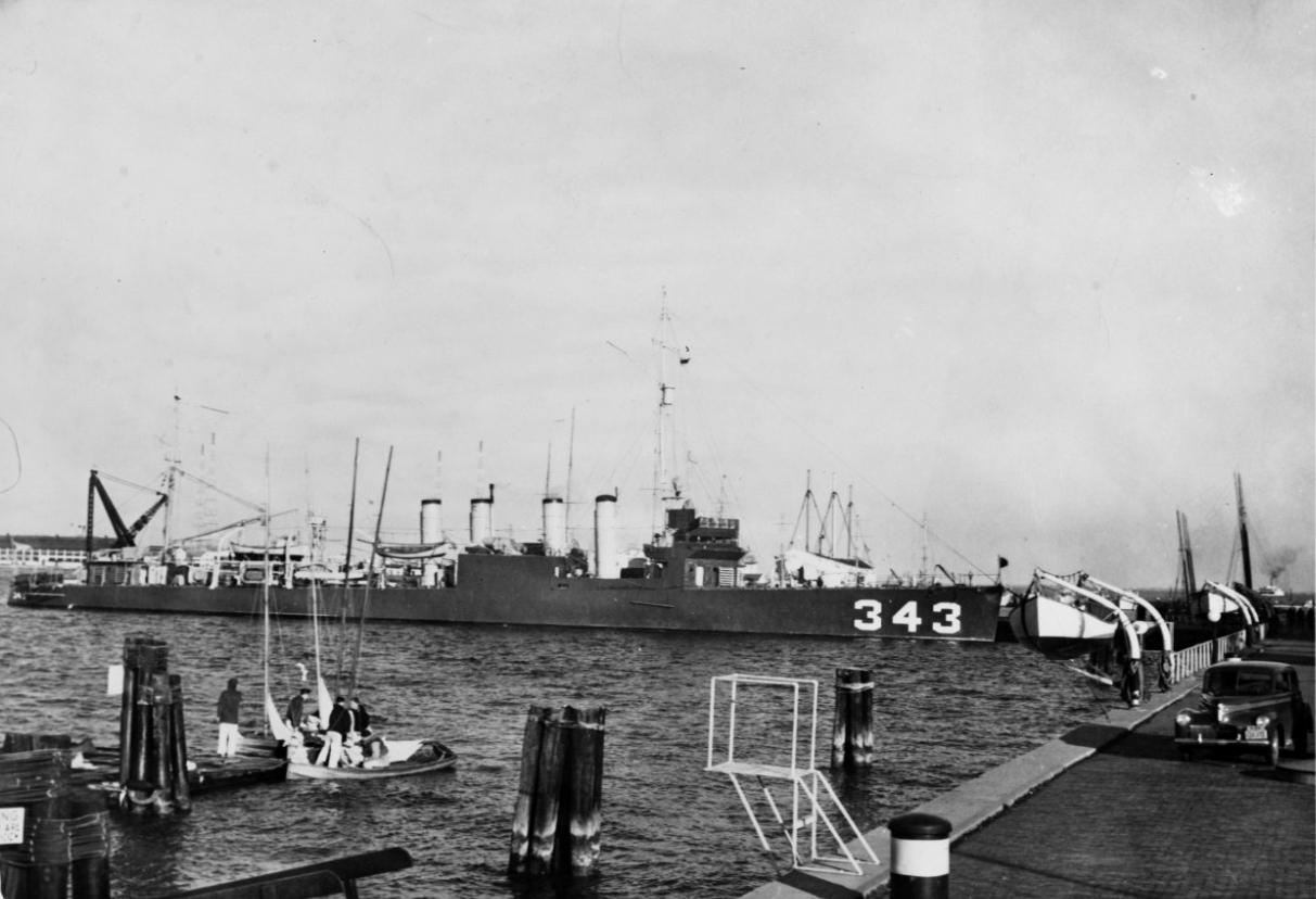 View of Clemson-class destroyer USS Noa (DD-343), taken at Annapolis, Maryland, 1 May 1941, at the U.S. Naval Academy. Note interesting dark paint scheme, with large bow numbers.
