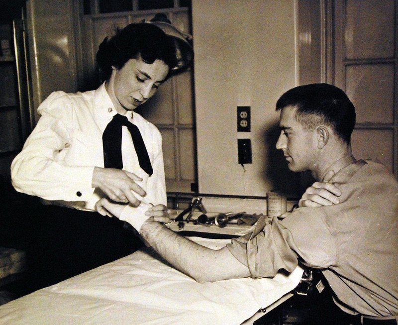 Lieutenant Walters tending to a patient. 