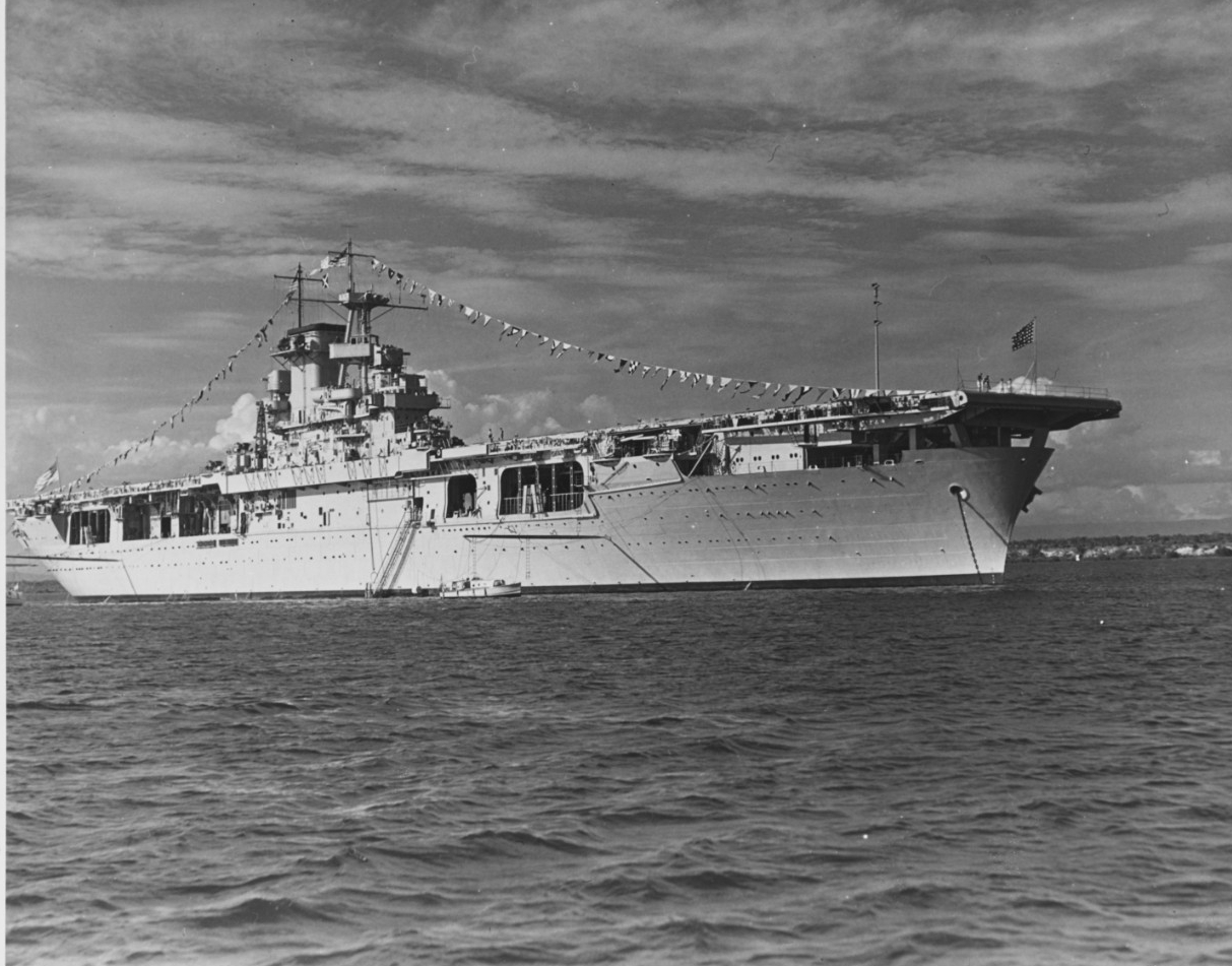 USS WASP (CV-7). Anchored at Guantanamo Bay, Cuba, “dressed ship” for Navy Day on 27 October 1940. Naval History and Heritage Command, NH 43461.