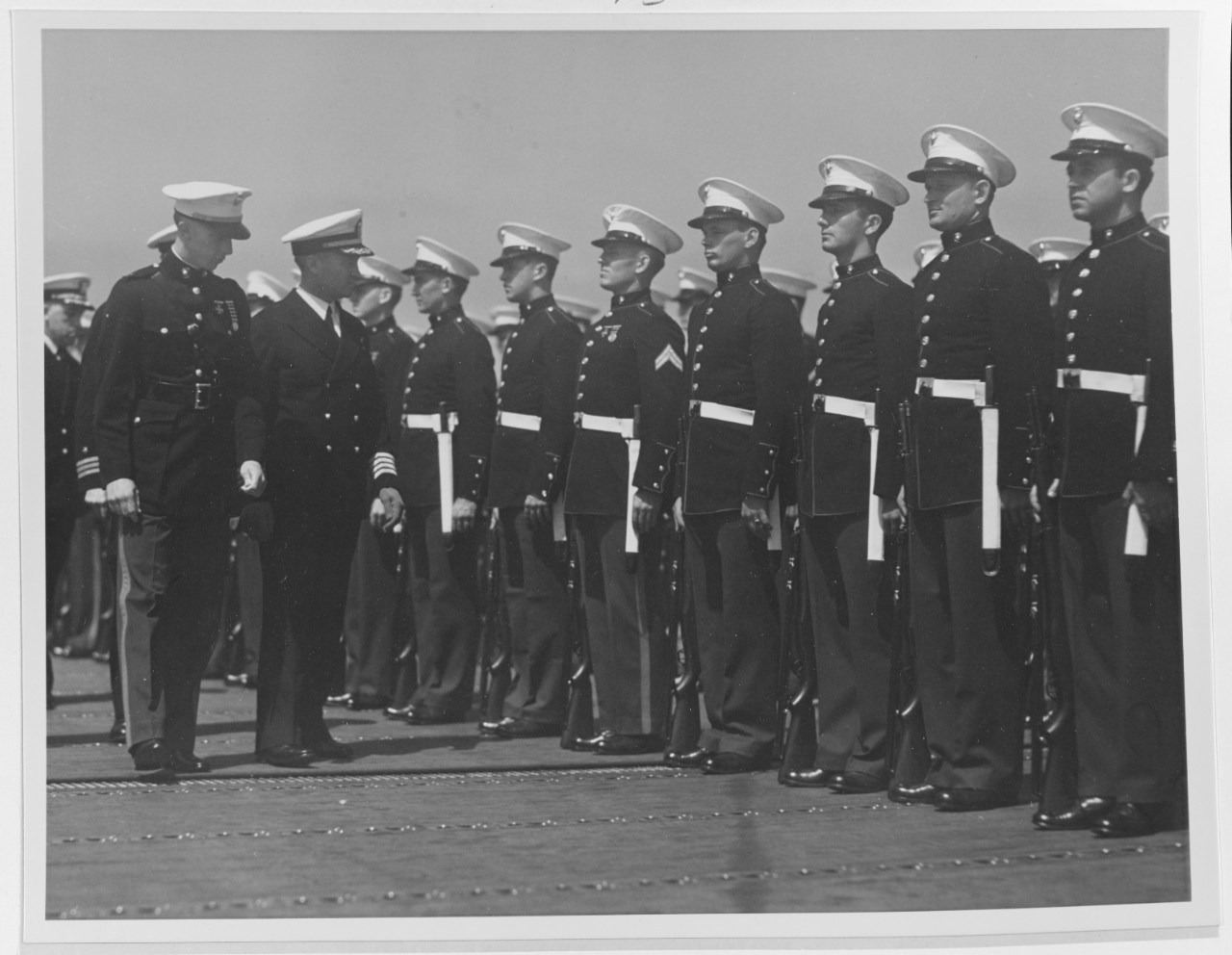 USS Wasp (CV-7) Captain Forrest P. Sherman, ship’s Commanding Officer, inspects her Marine detachment. Taken at San Diego, California, in June 1942. Official U.S. Navy Photograph 80-G-K-763, now in the collections of the National Archives