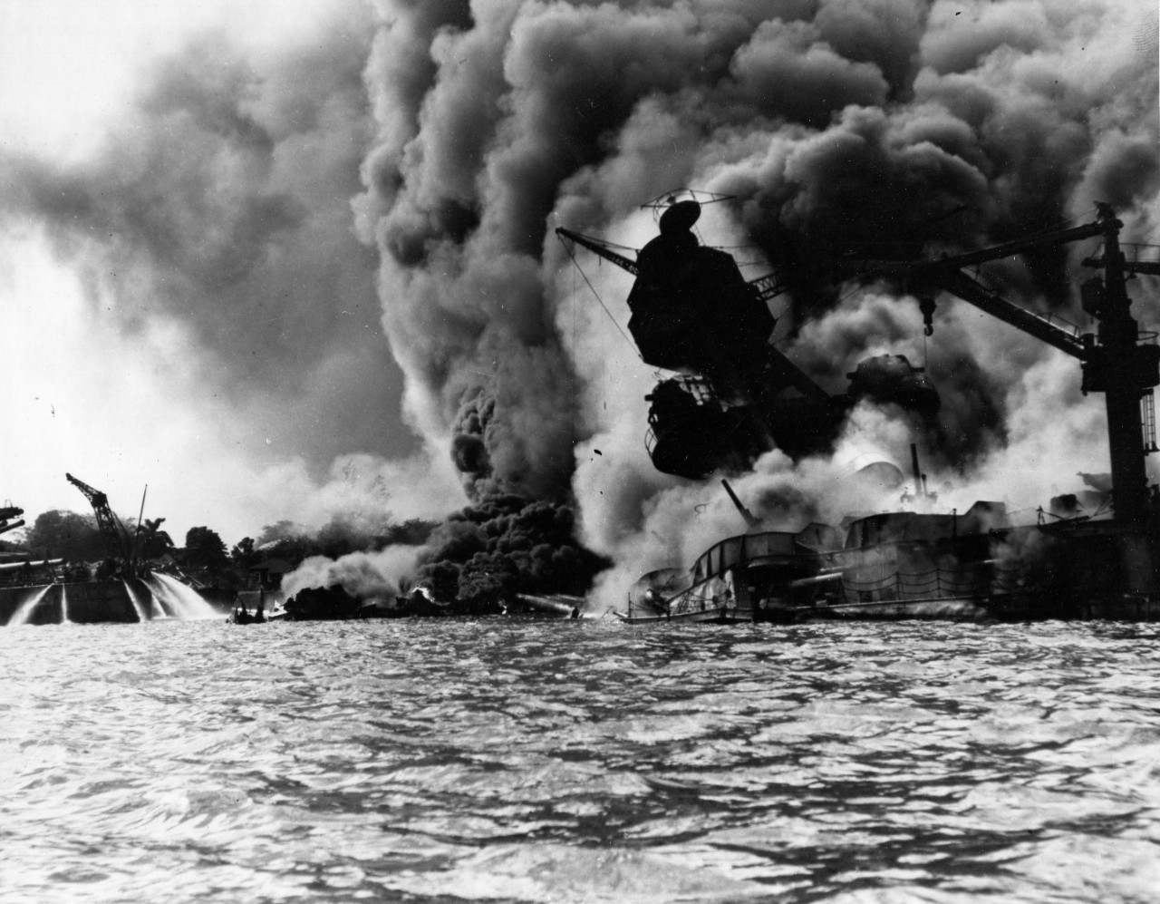 USS Arizona (BB-39) sunk and burning