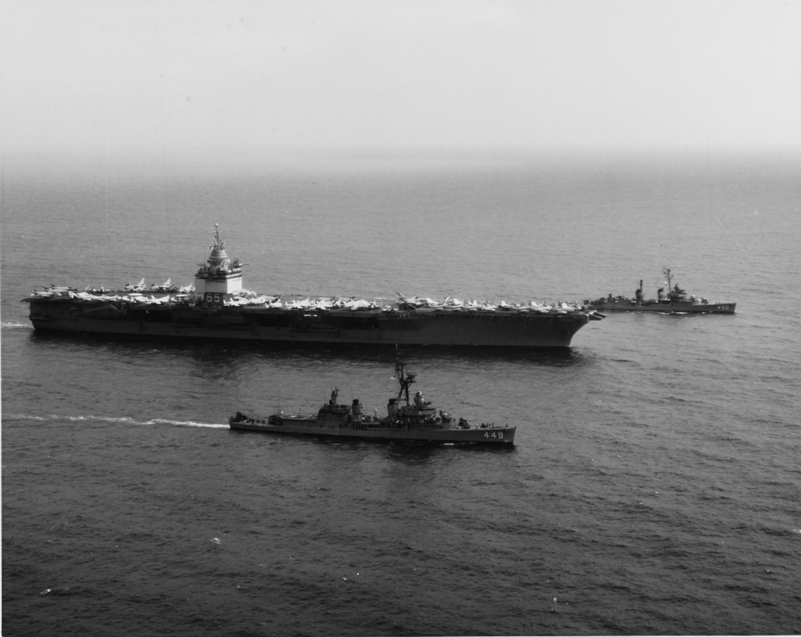 USS Enterprise (CVAN-65) steams in formation with USS Nicholas (DD-419) and USS O’Bannon (DDE-450)