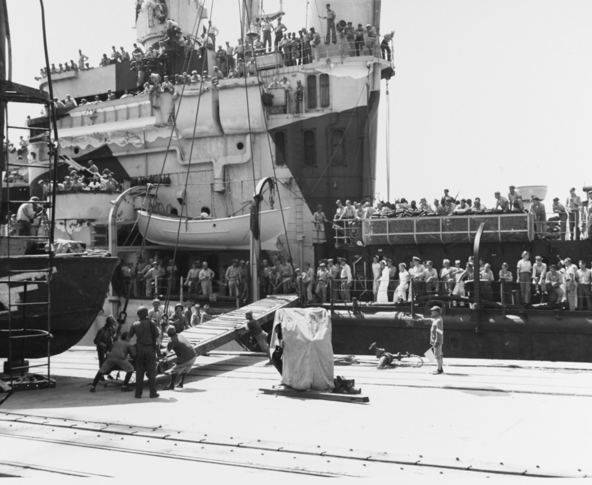 A Japanese working party rigged the gangway as USS San Diego (CL-53) docks