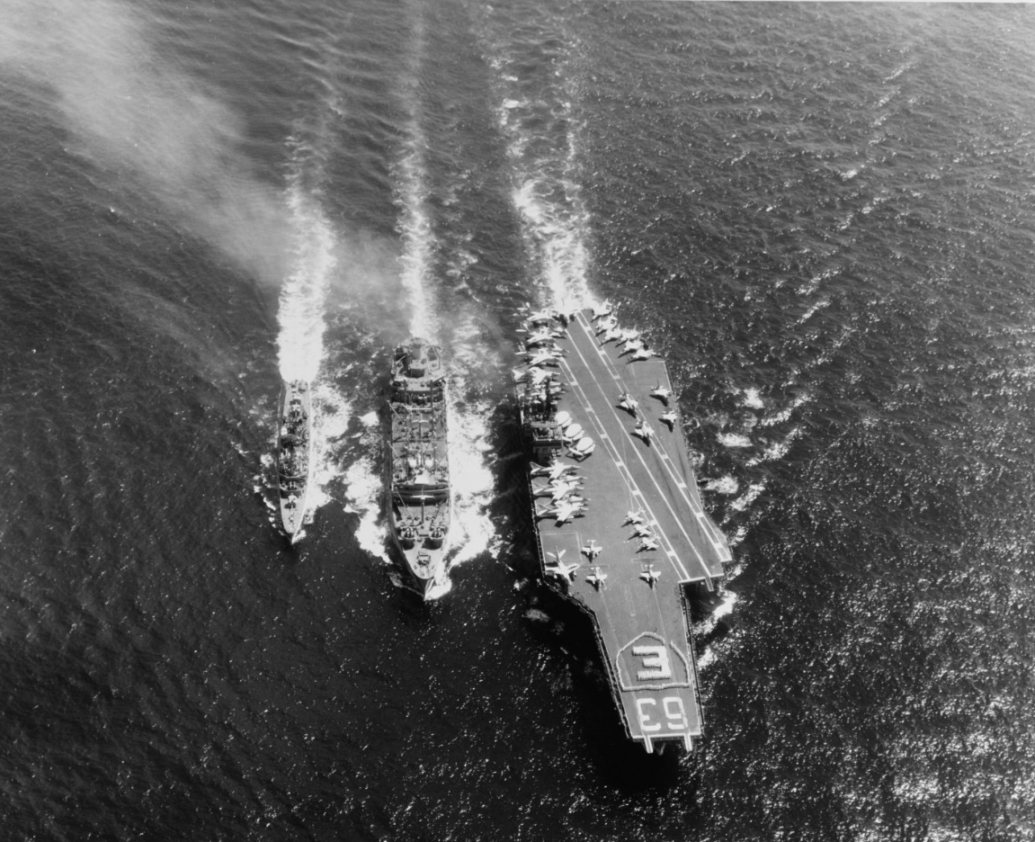 USS Kitty Hawk (CVA-63) and USS Turner Joy (DD-951) refueled from USS Kawishiwi (AO-146)