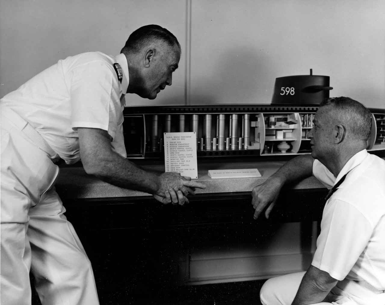 Rear Admiral William F. Rayborn, USN (left), and Admiral Arleigh A. Burke, USN, Chief of Naval Operations
