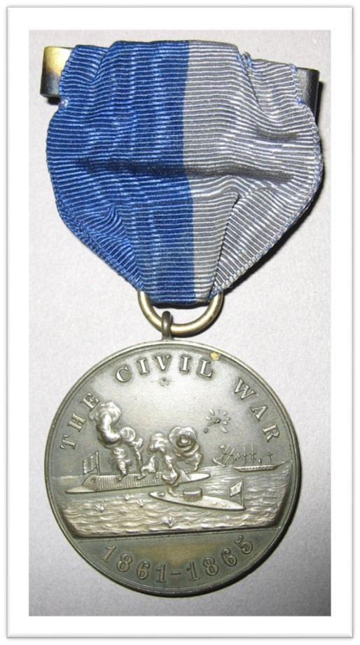 Close-up image of a Civil War service medal with blue-and-gray ribbon on white background