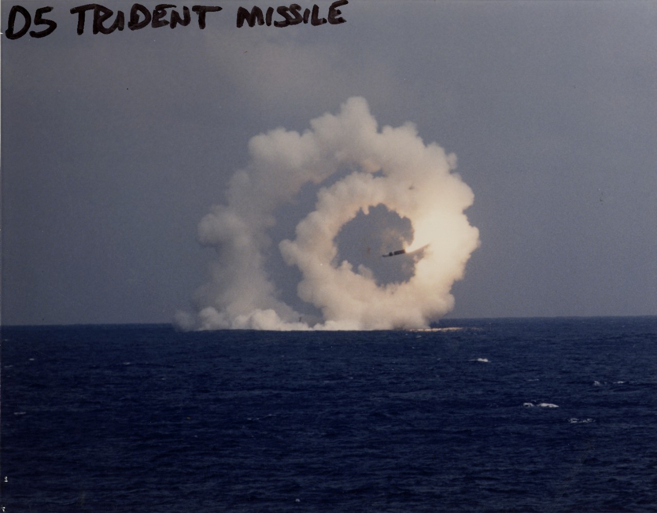Faulty missile leaves a spiral cloud over the sea