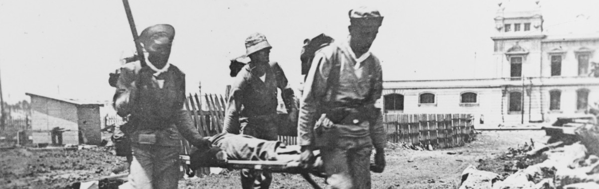 Sailors from USS FLORIDA serve as stretcher bearers in Veracruz, Mexico, in April 1914