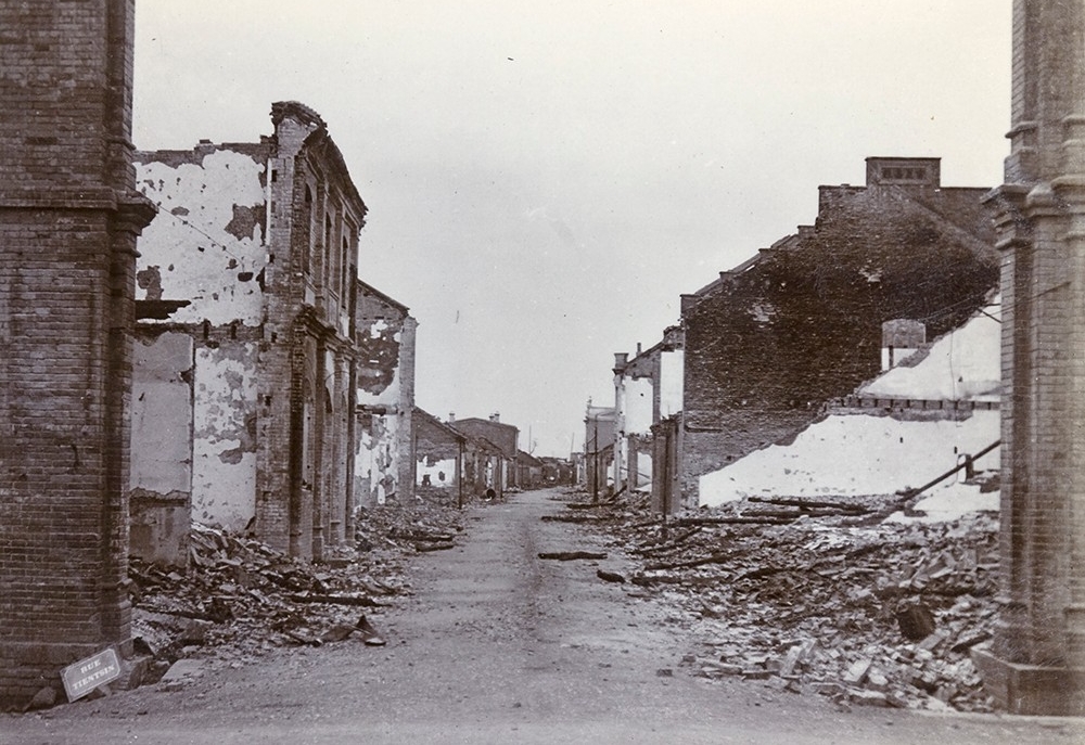 Street of destroyed buildings.