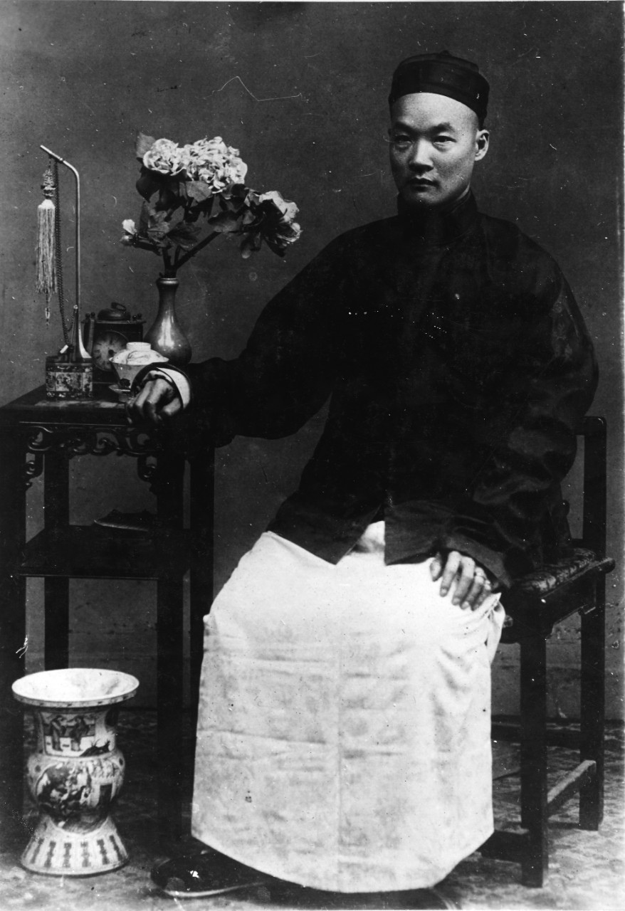 Chao Yin-Ho seated. Clicking this linked image leads to a page where the photograph can be downloaded.