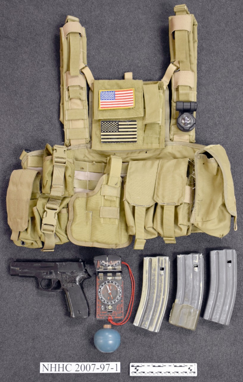 Tan modern tactical vest with magazines, dummy pistol, Grenade and compass with signalling light 