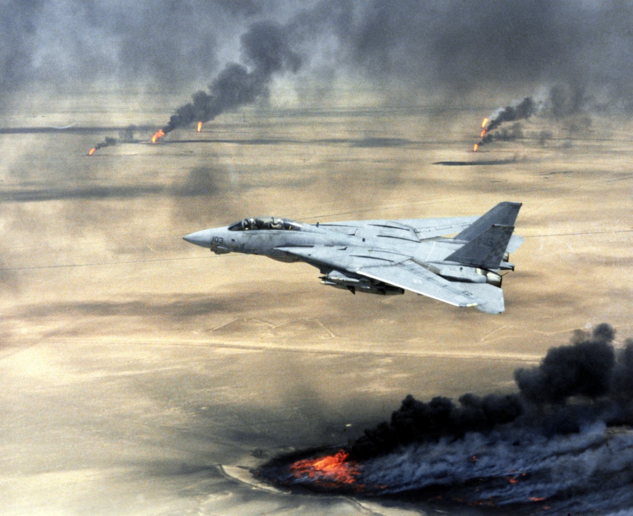 F-14A Tomcat over burning Kuwaiti oil wells