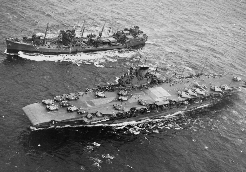 <p>HMS&nbsp;<i>Victorious</i> undergoing replenishment at sea (RAS) with USS <i>Cimarron</i> (AO-22), 12 July 1943.&nbsp;</p>
