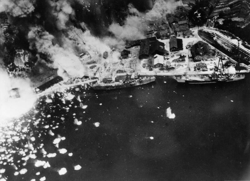 View of an air strike on Shannoshu shipyard on Injoshima, Inland Sea, Japan, carried out by aircraft from Victorious, 28 July 1945 