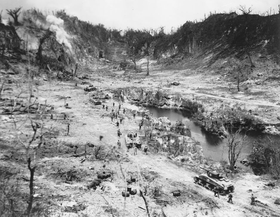 Marine infantry and tanks push into the Horseshoe Bend area of the Umurbrogol ridges on Peleliu, late September 1944 (USMC 97433).