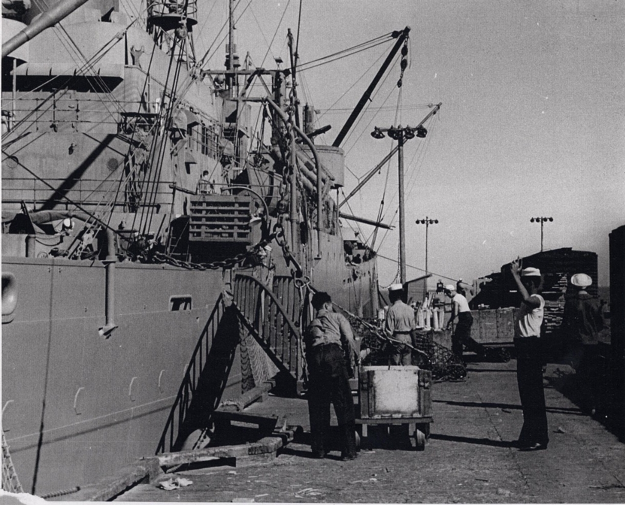 <p>African American sailors loading ordnance aboard a cargo ship, Port Chicago Naval Magazine, circa 1943/44.</p>
