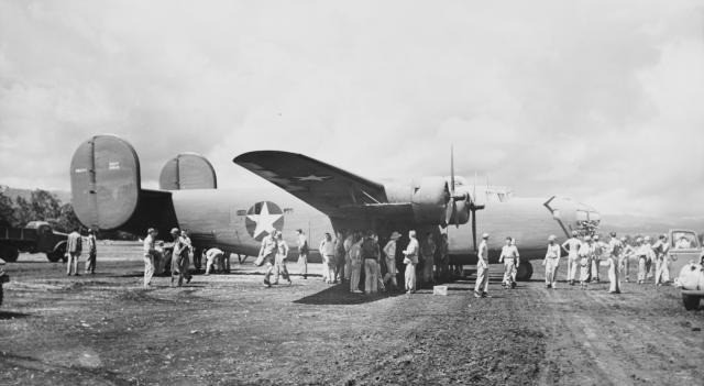 Marine ground crews and airmen service a PB4Y-1 Liberator at Henderson Field on Guadalcanal. By seizing the airfield, Allied forces were able to gain a “home team” advantage, enabling the Cactus Air Force to fly consistently on interior lines. U....
