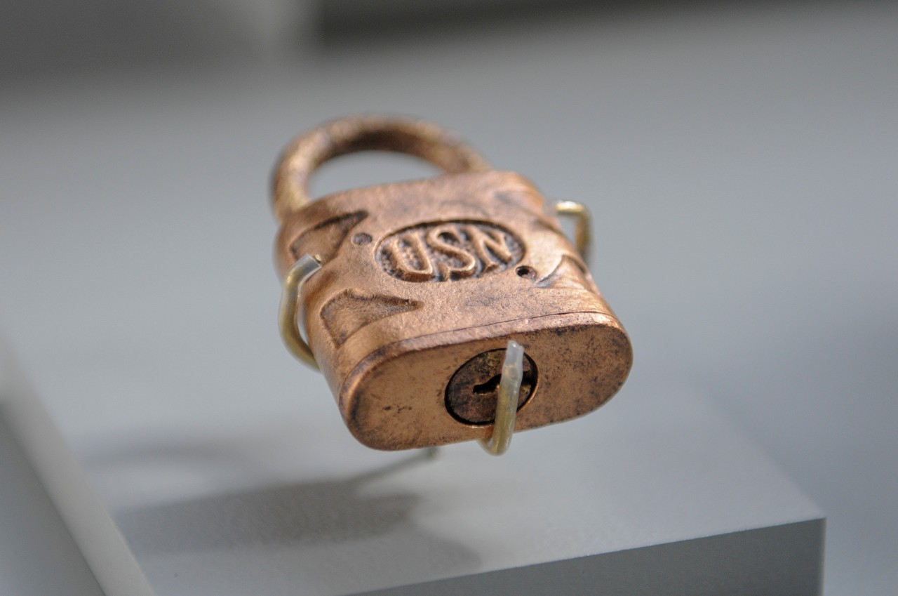 USN-marked padlock recovered from the wreck of the armored cruiser USS San Diego 