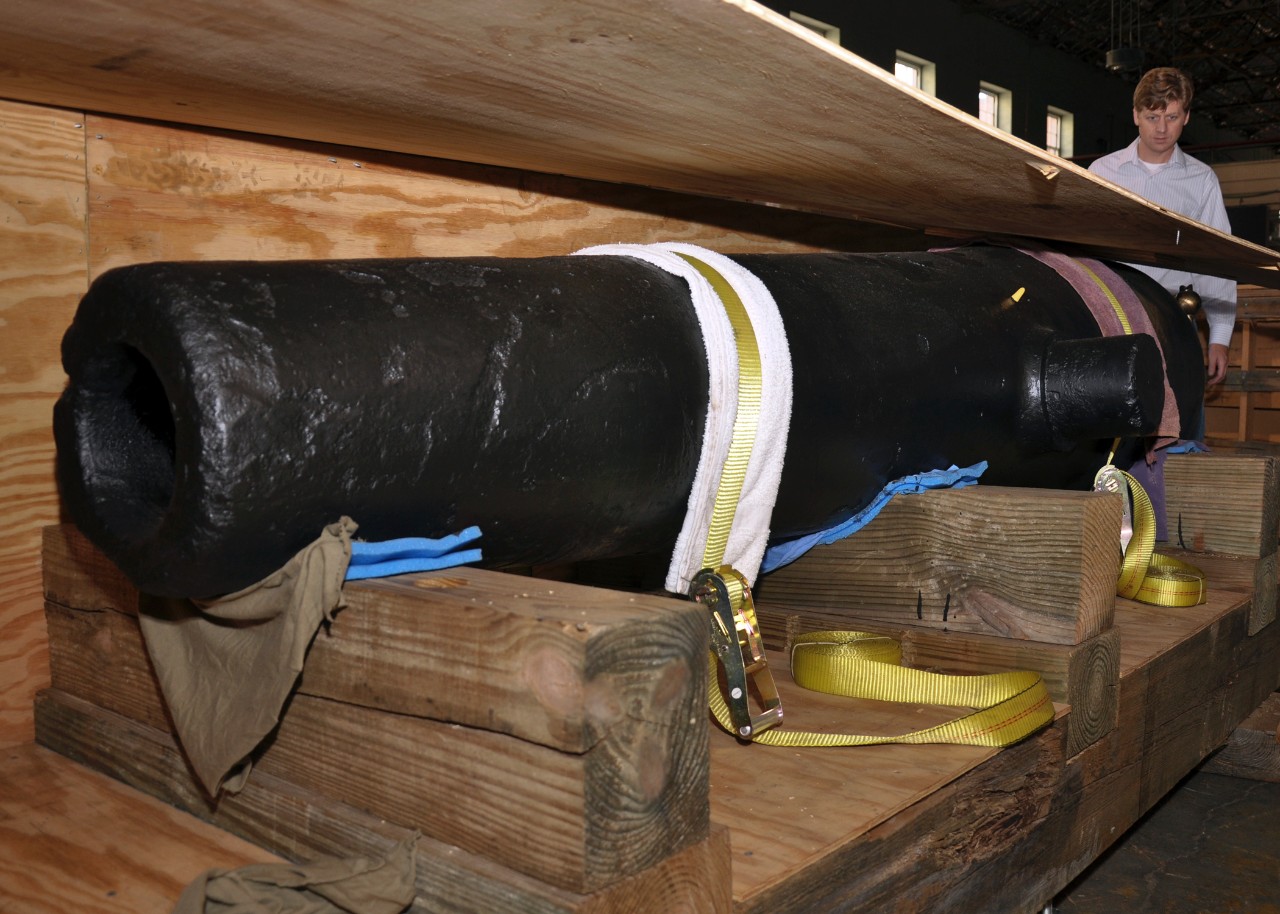 A 32-lb cannon recovered from the wreck of the Confederate sloop-of-war CSS Alabama is seen at the Naval History and Heritage Command laboratory warehouse. 
