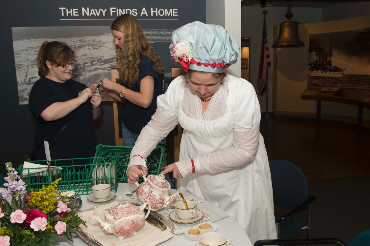 Period re-enactor Heather Hufton, from the Virginia Regency Society, pours tea 