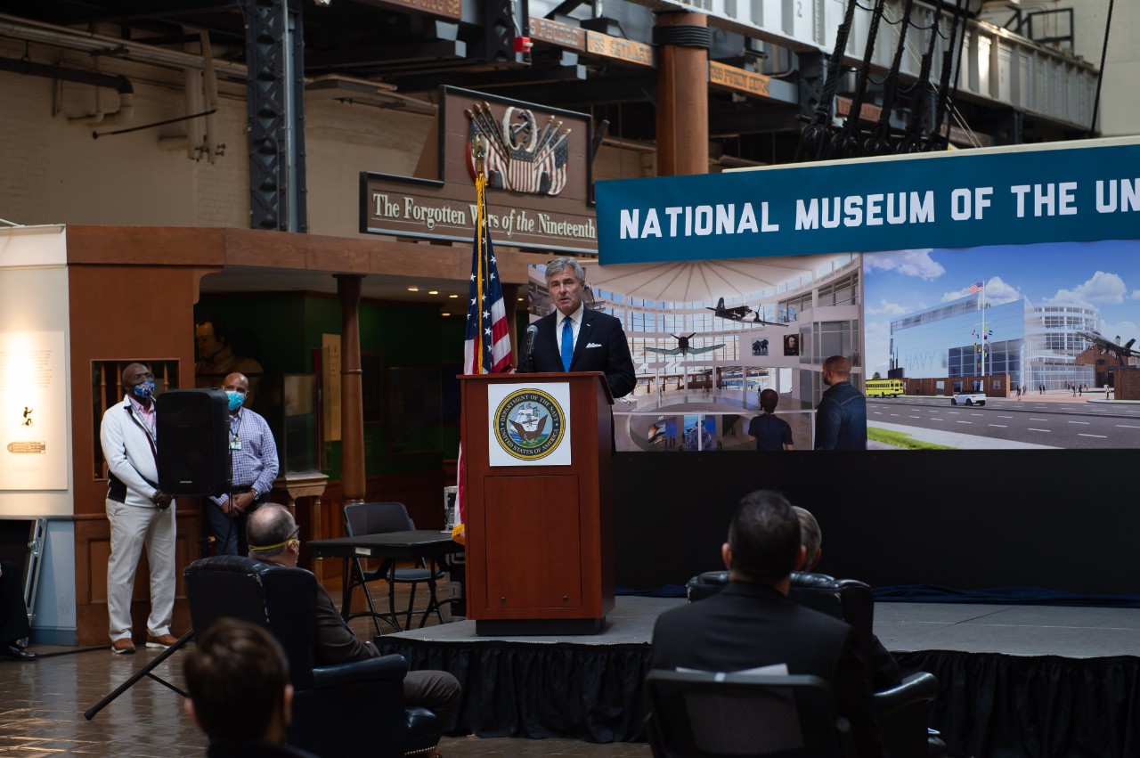 Secretary of the Navy, Kenneth J. Braithwaite gives a speech during the announcement ceremony of the new National Museum of the United States Navy (NMUSN) in the current NMUSN. To honor the service of American Sailors and enhance the public understanding of the Navy’s history and heritage, the Navy is creating a new NMUSN. Naval History and Heritage Command, located at the Washington Navy Yard, is responsible for the preservation, analysis, and dissemination of U.S. naval history and heritage.