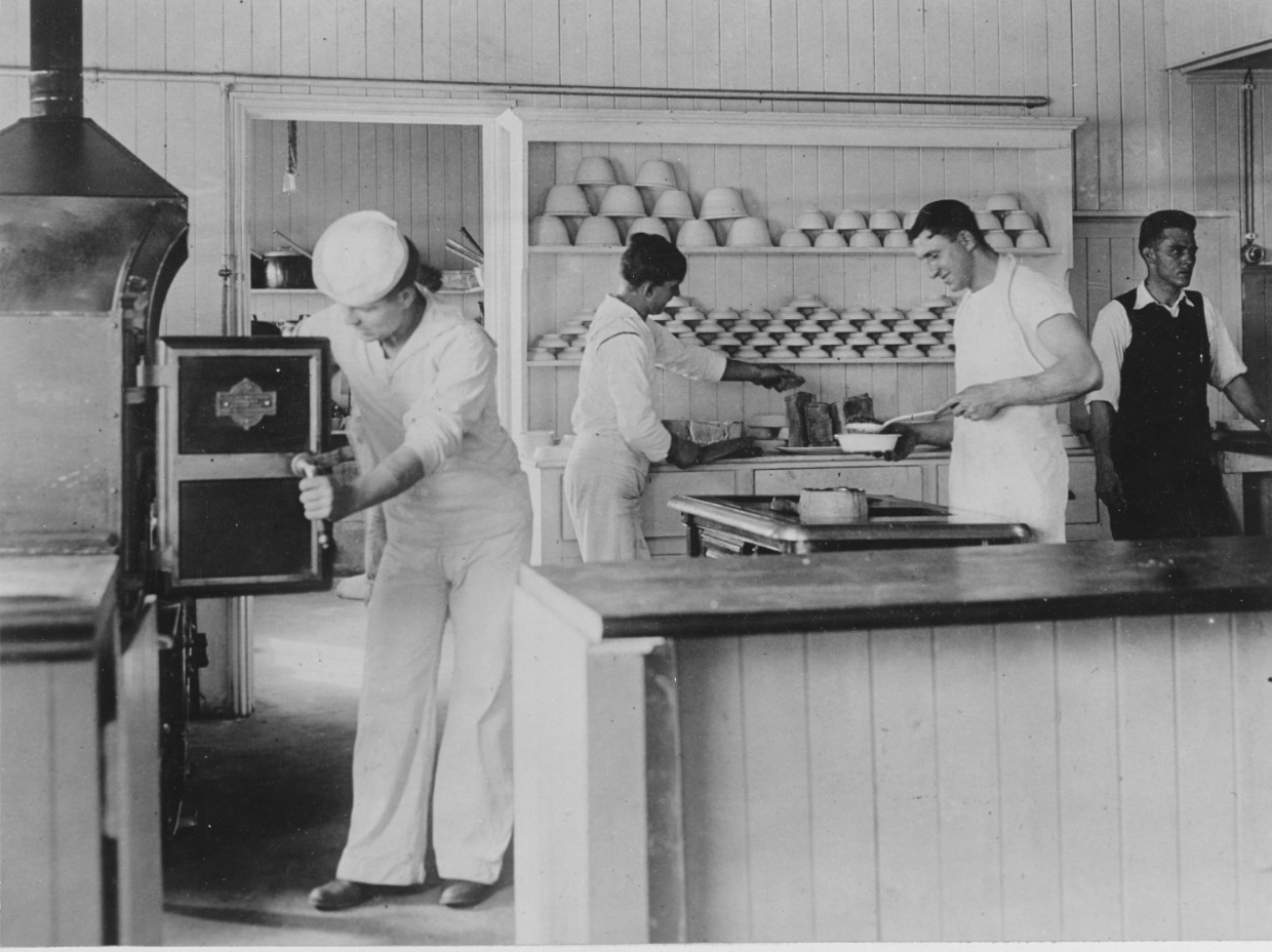 With the American Navy in wartime. U.S. Naval men's club cooks at work