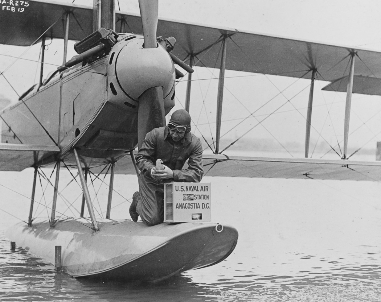 Releasing carrier pigeons from a seaplane