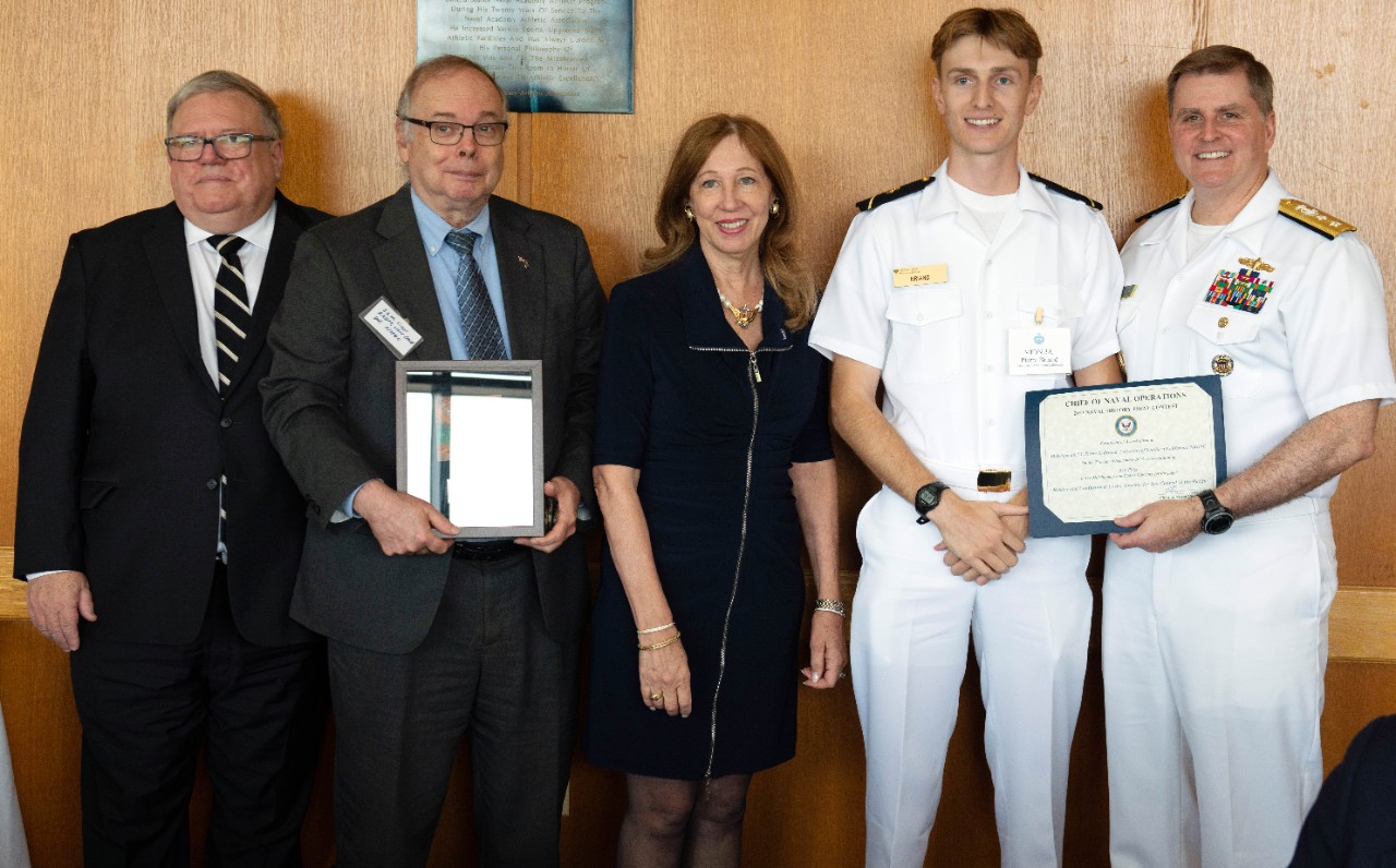Rear Adm. Fred Kacher, acting Superintendent for the Naval Academy; Naval History and Heritage Command Director, retired Rear. Adm. Sam Cox; Dr. Jennifer London, Chair, Navy League Foundation Board of Directors; and Chief Executive Officer of the...
