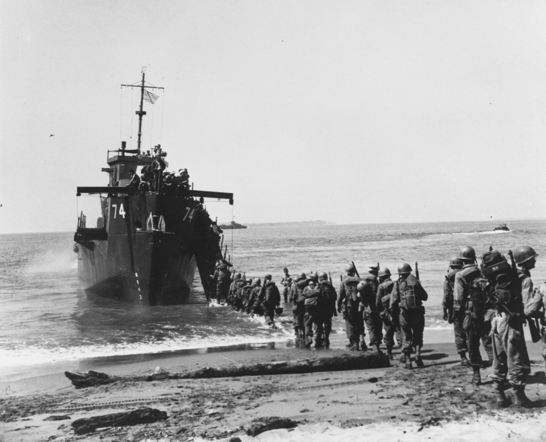 Soldiers from 1st Battalion, 163rd Infantry, embark on LCI-74 at Aitape, New Guinea