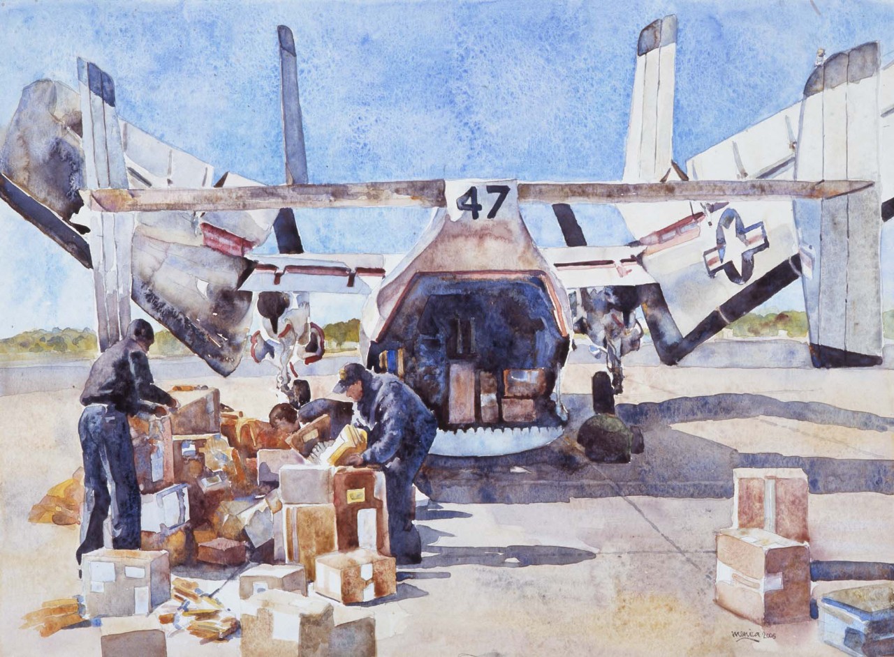 Two sailors preparing mail for transport by airplane