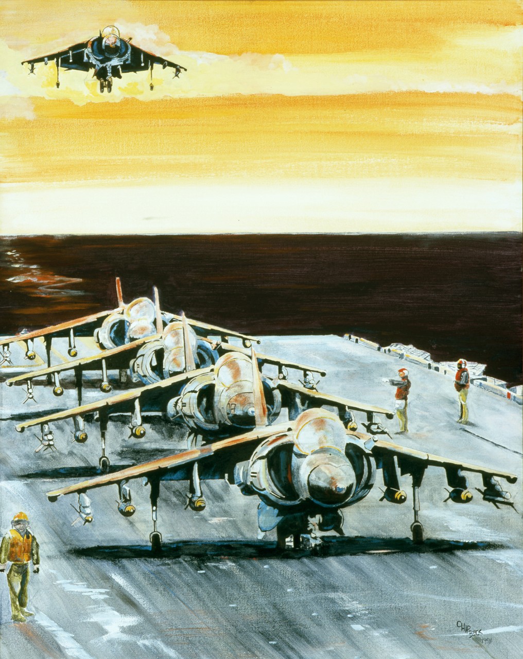 A plane comes in for a landing on a carrier with planes lined up on deck