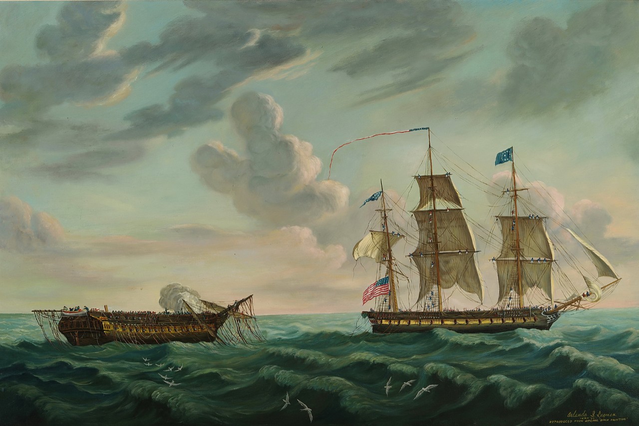 The demasted British ship is on the left with the American ship sailing on the right side