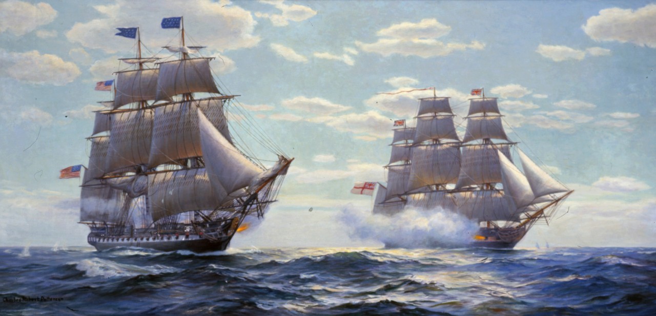 Two sailing ships, American on the left British on the right firing canons at each other
