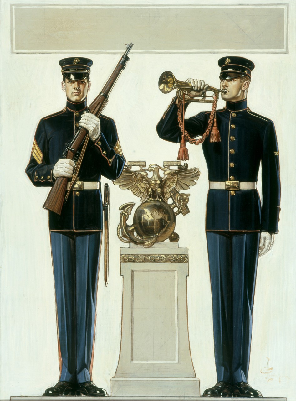 Two marines in dress uniform. The one on the left is holding a rifle, the one on the right is blowing a bugle