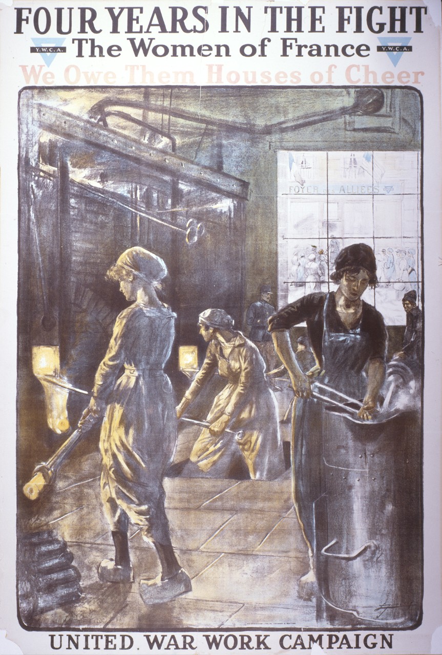 Women casting metal in a factory