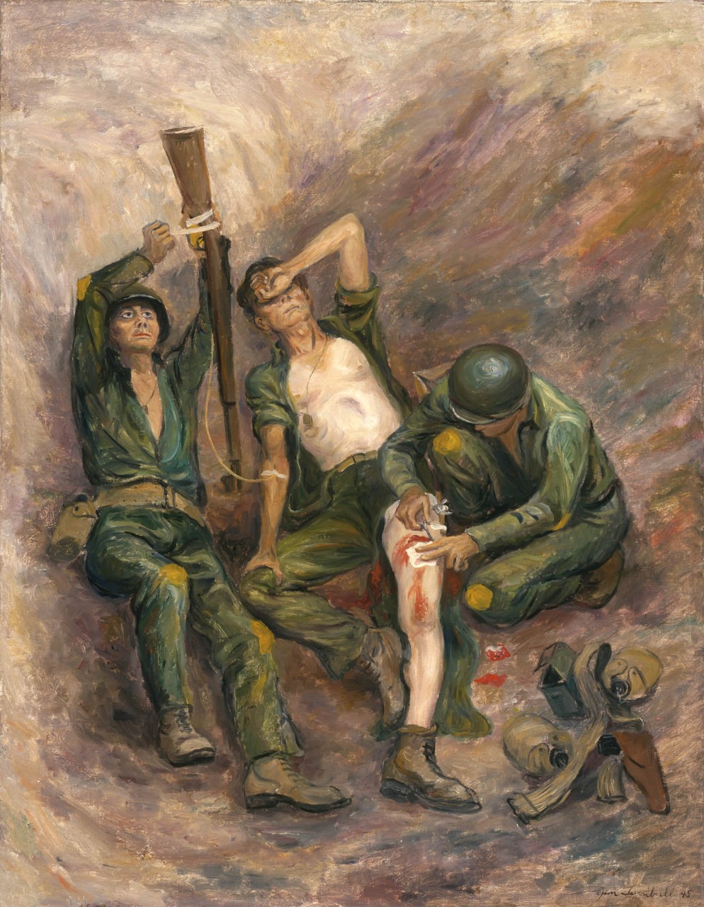Two medics treat a wounded man