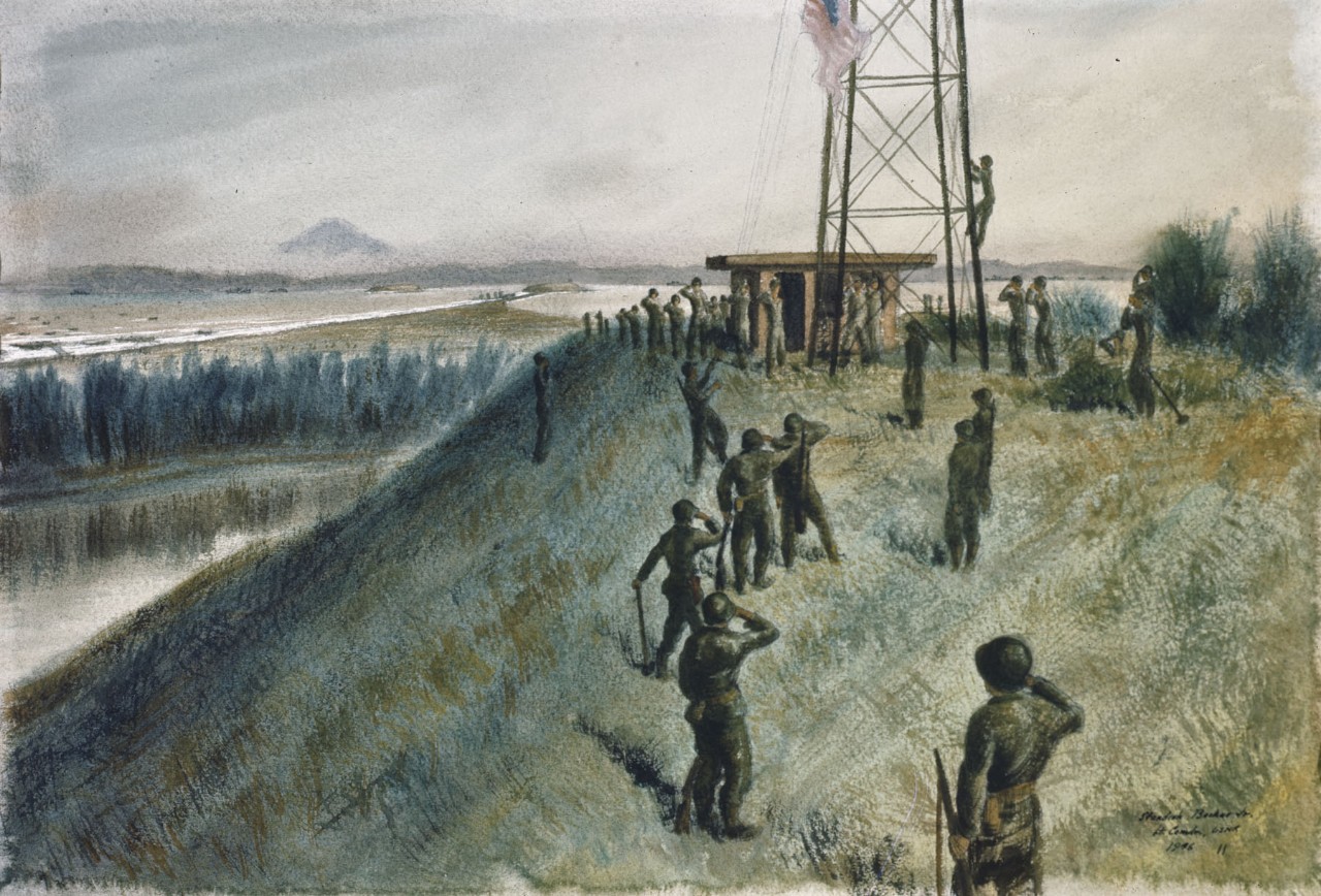 Soldiers stand around a tower