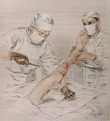 A doctor and a nurse treat a leg wound