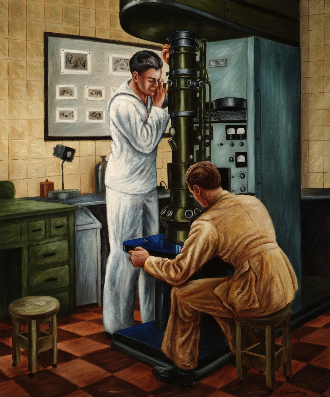 Two men work with an electron microscope