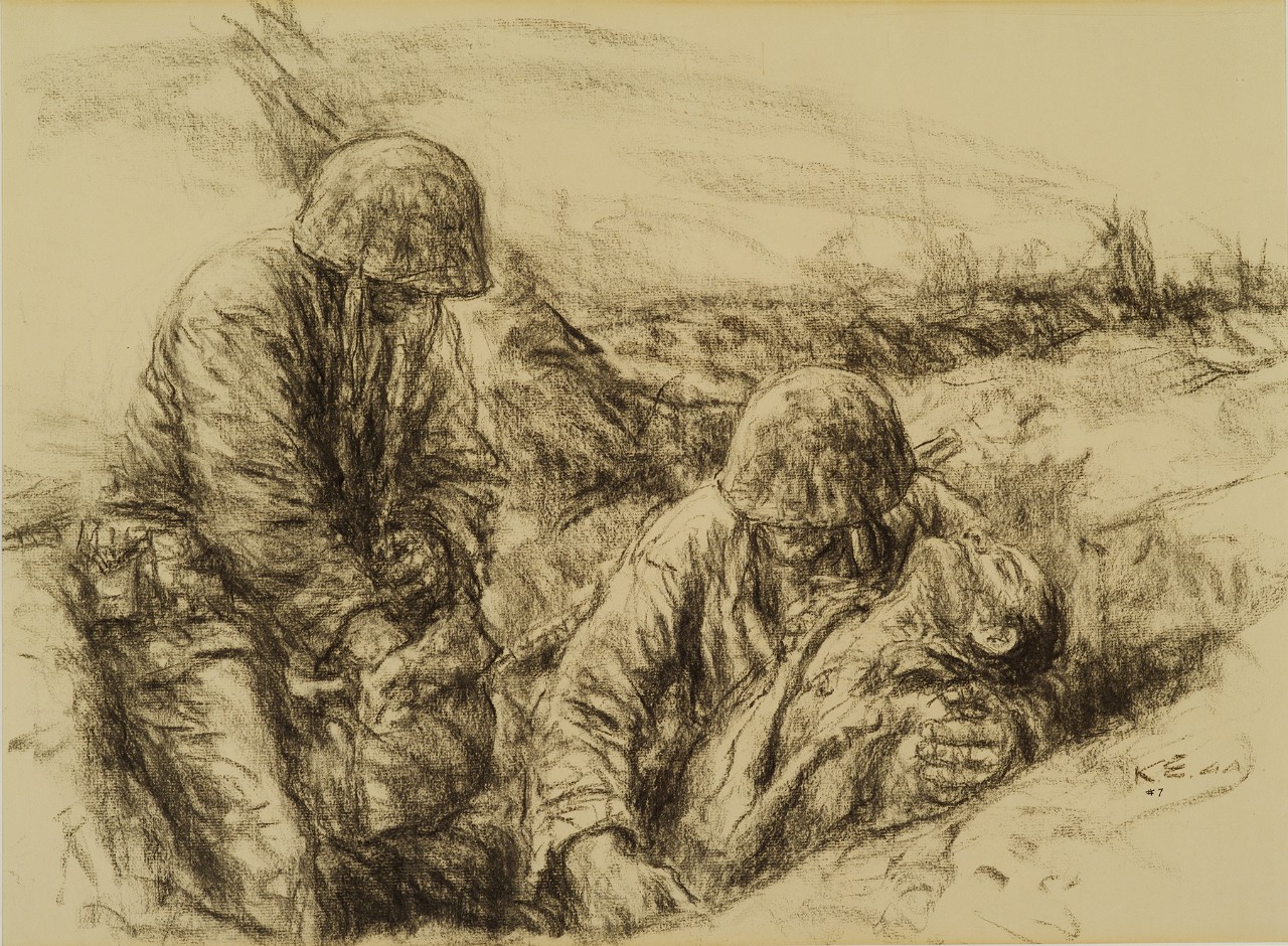 Two corpsmen aid a Marine in a foxhole