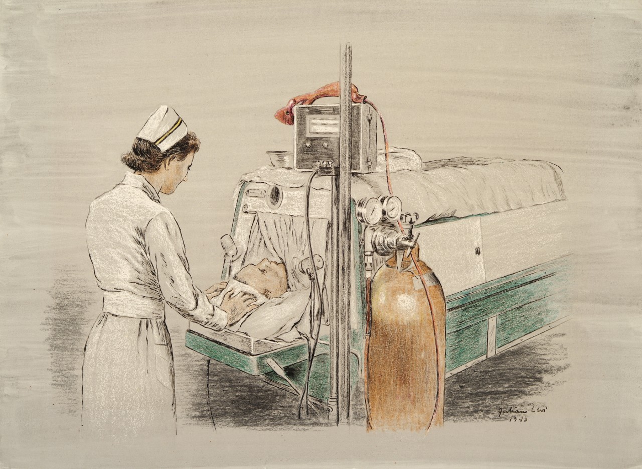 A navy nurse watches over a man in a chamber