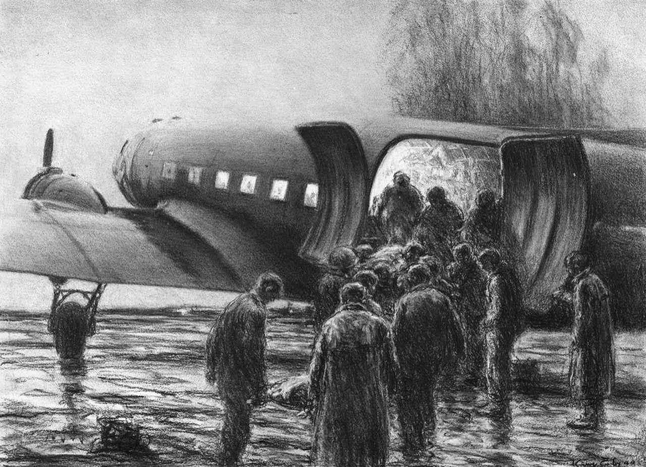 A line of wounded head toward the plane